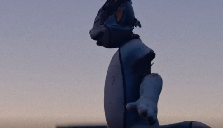 A weathered concrete playground animal figure from Moment of Significance against a pale evening sky.