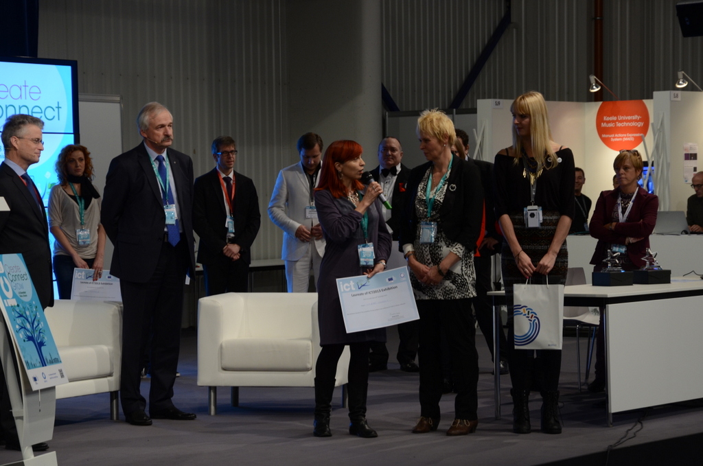 ICT & Art Connect stand receiving Best Booth Award at ICT2013